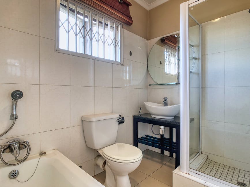 Plastový sifón k umývadlu 1 1/4 palca s výpusťou a zátkou na retiazke